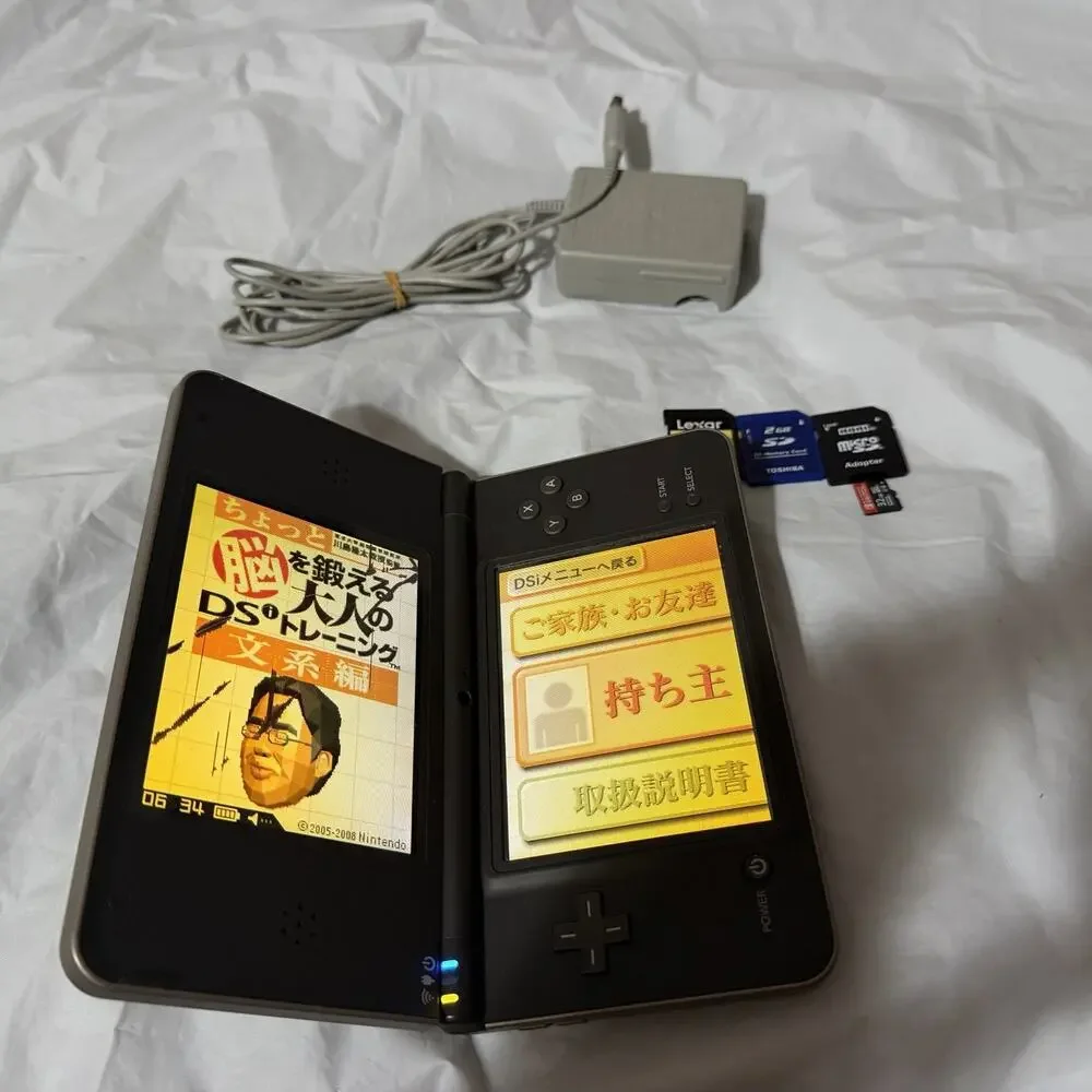 Nintendo DSi LL Bronze/Dark Brown Japanese Version Plays US Games RD DESCRIPTION